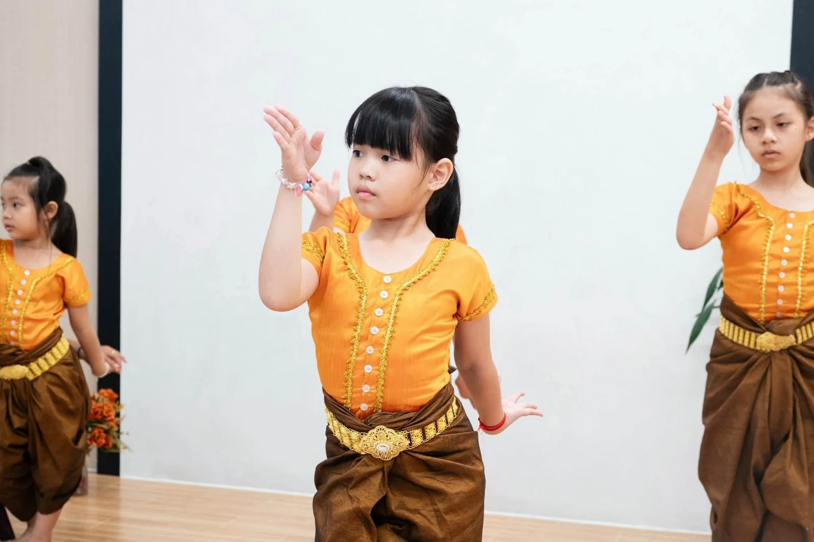Young learners practising traditional Khmer dance